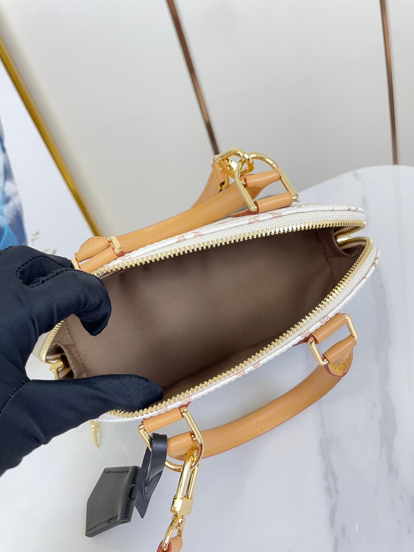 ALMA BB 25 IN WHITE MONOGRAM DUNE CANVAS GOLD HARDWARE